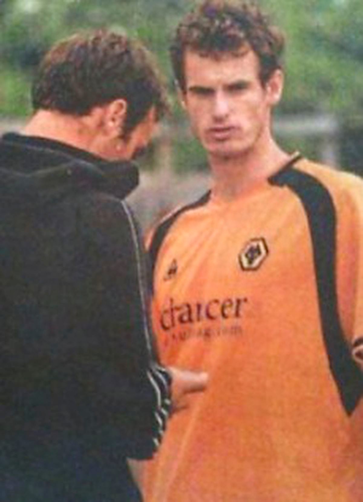 Andy Murray in a Wolves shirt
