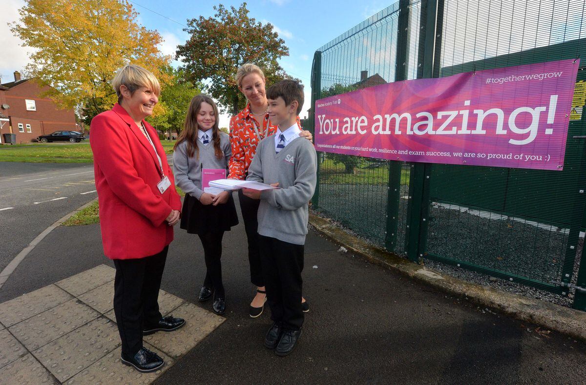 Headteacher Julie Johnson with the head of Grange Primary School, which is also part of the Trust. Pupils are: Jess Thomas 11 and Billie Hart 11