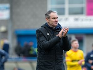 Kevin Wilkin (AFC Telford United Manager)clapping fans after beating Banbury 2-1.