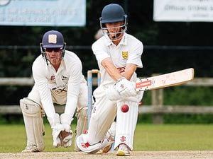 Shropshire batter Andre Bradford reverse sweeps on day two of their clash with Wiltshire