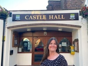 Rachel Connolly in front of Castle Hall