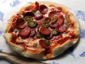 Nice slice – pizza with tomato, pepperoni, mozzarella, chorizo and jalapenoPictures by Russell Davies