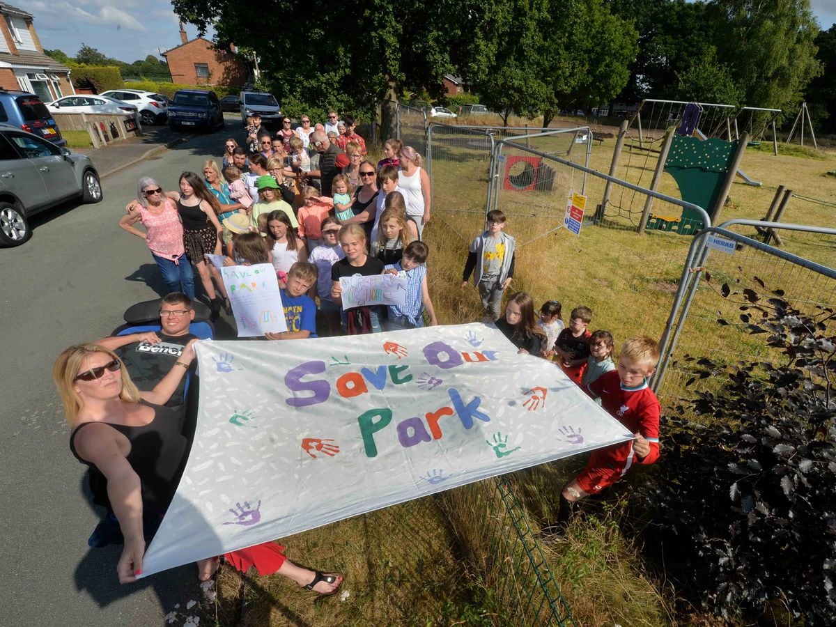 Vicki Brimley and residents of Dutton Close in Stoke Heath, Market Drayton, where the children's area has been fenced off and is in danger of being flattened by housing developers
