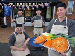 Lisa Wall shows off the award winning pies alongside her colleagues Mal Holland, Bradley Richards, Wendy Richards.