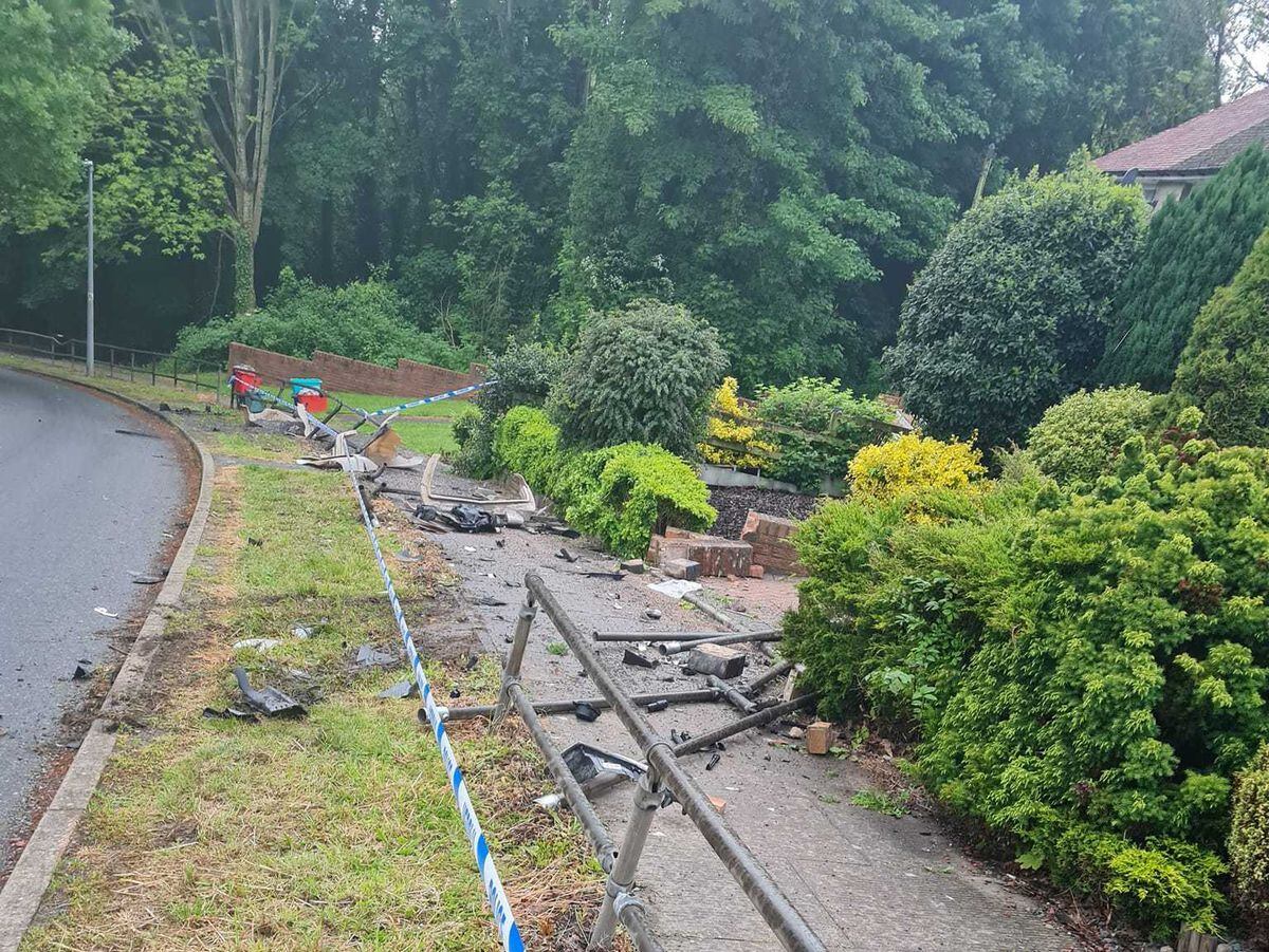 The driver fled after crashing through a set of railings and into a garden wall in Welshpool