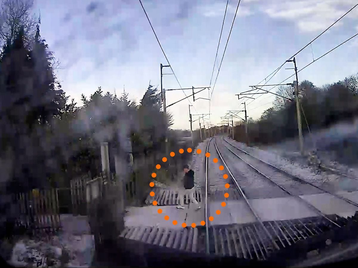 CCTV shows the moment a pedestrian narrowly escaped being hit by an express train. Image: Network Rail/Avanti West Coast