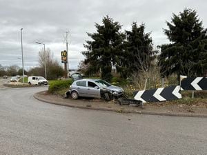 Police shared a photo of the damaged car stuck on the roundabout. Photo: North Shrops SNT