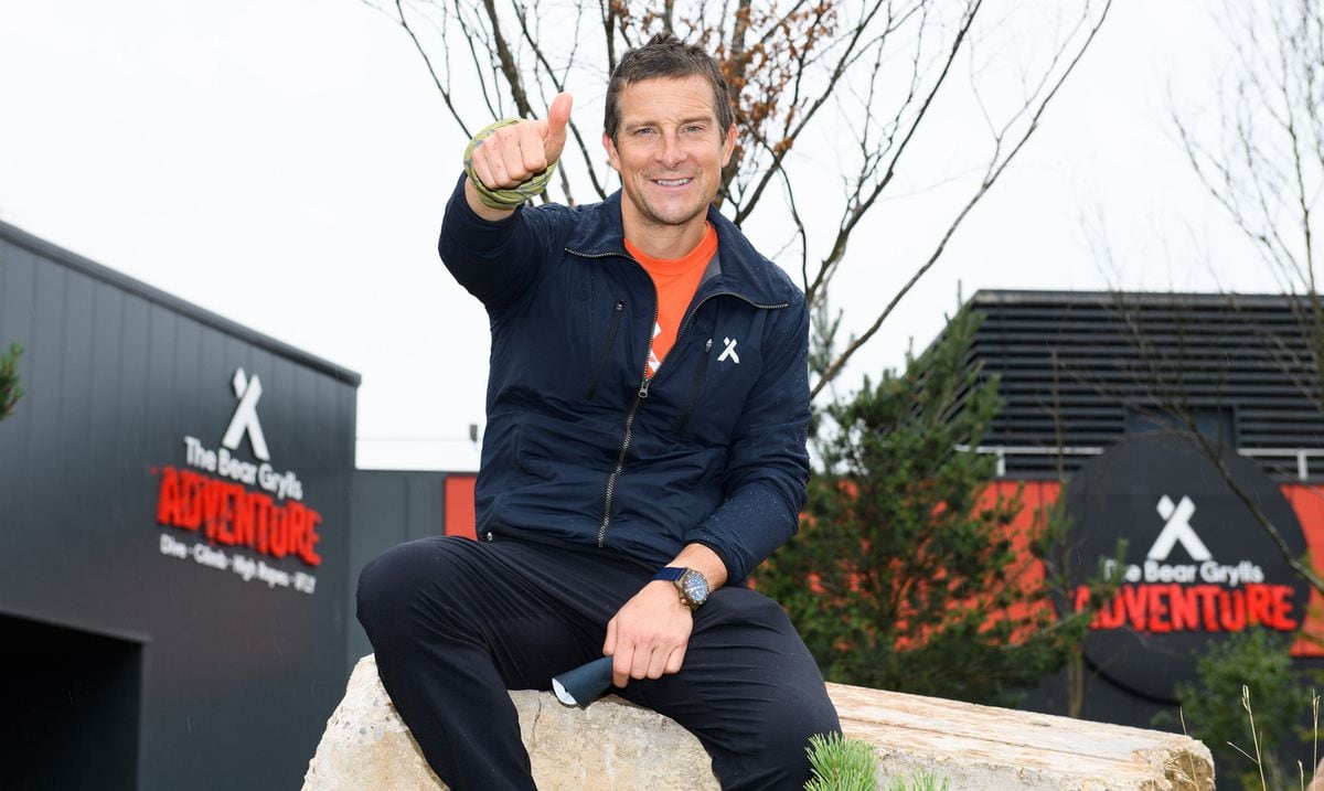 Bear Grylls outside the attraction.