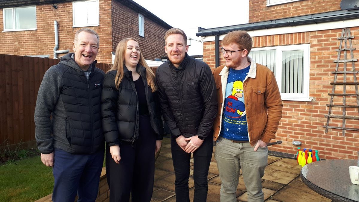 Charlotte at home with her father and step-brothers. From left Wing Commander Neil Hope, Charlotte Hope, Chris Hope, and Seb Hope.