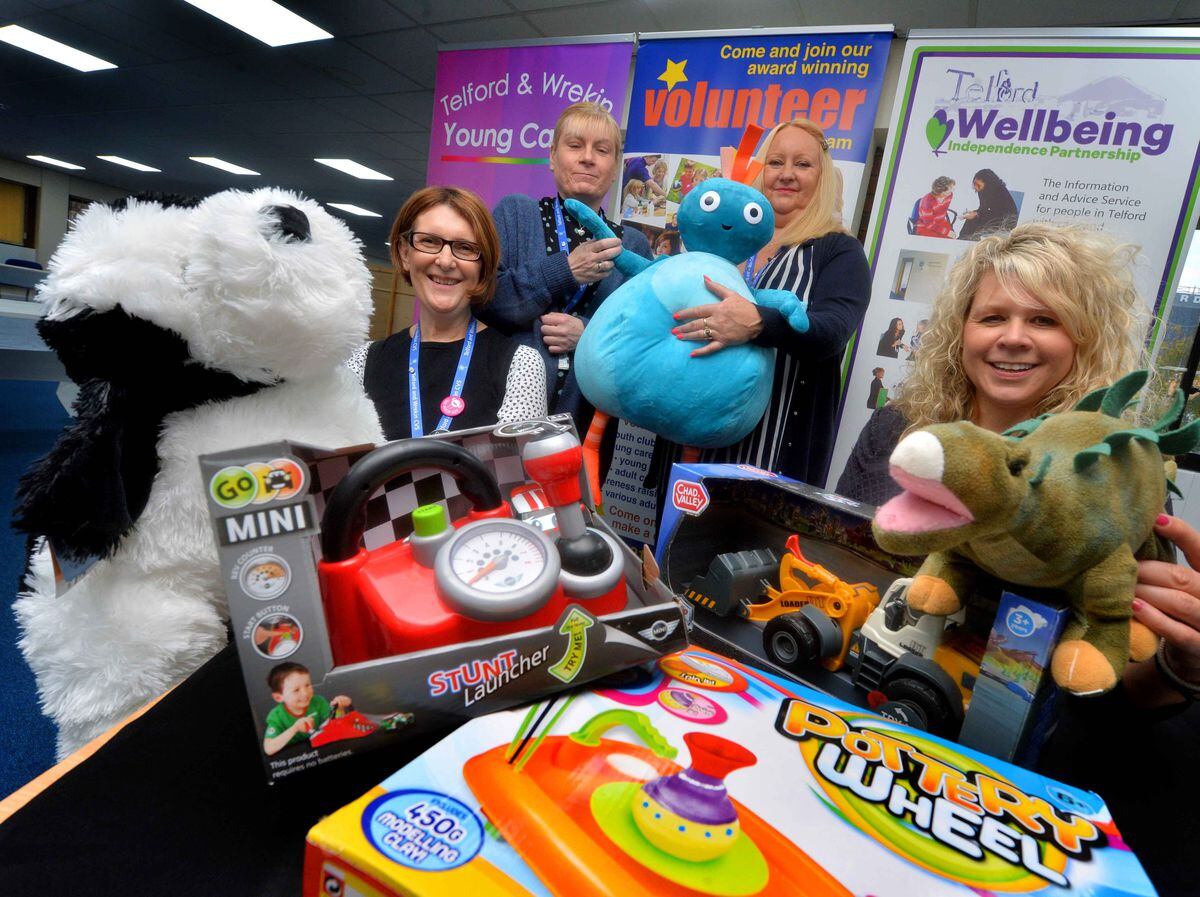 Staff at Telford & Wrekin CVS get behind the Shropshire Star Christmas Toy Appeal: Lucie Roberjot and Laura Thorogood, seated, and Claire Alford and Sue Last, behind