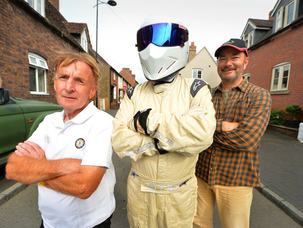 The Stig with Italian Automoto Club director David Morris, left, and Jeremy Dutton