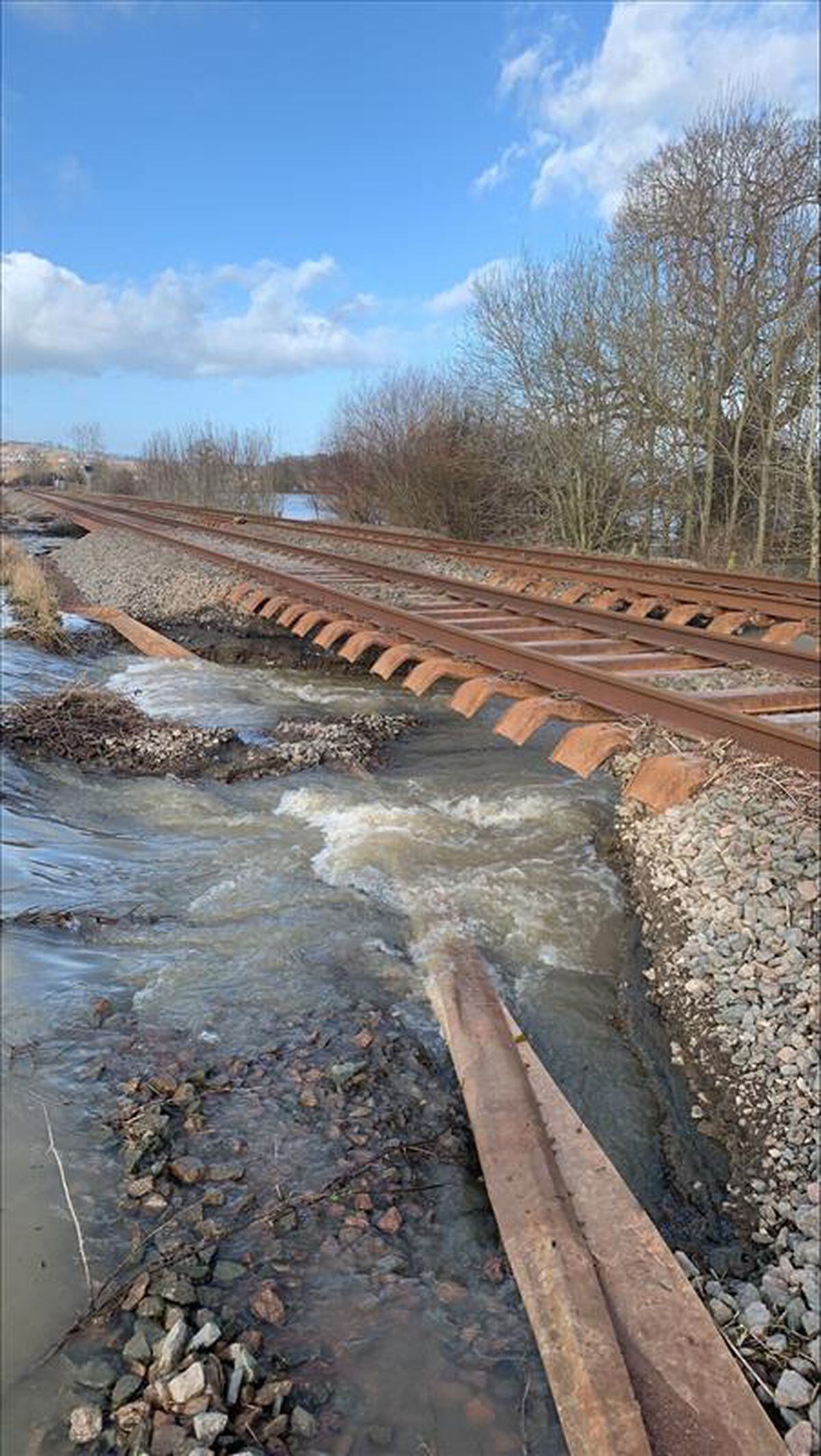 Damage to the Cambrian Line near Welshpool is extensive, with at least 12 places in just half a mile needing repair