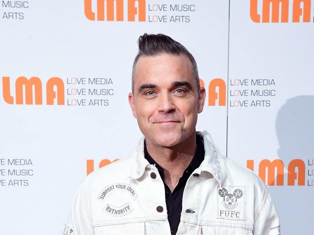 Robbie Williams announces more musical plans for Christmas | Shropshire Star
