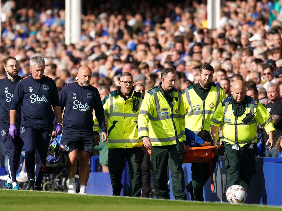 Everton defender Ben Godfrey is carried off on a stretcher