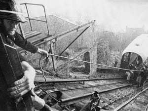 Firemen rescuing passengers when Bridgnorth Cliff Railway came to a halt during a power cut due to the 1970s miners' strikes (picture: Mike Hayward)