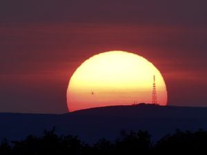 Sunday's sunset seen from Ellesmere with the Selattyn transmitter silhoutted . photo: Sue Austin