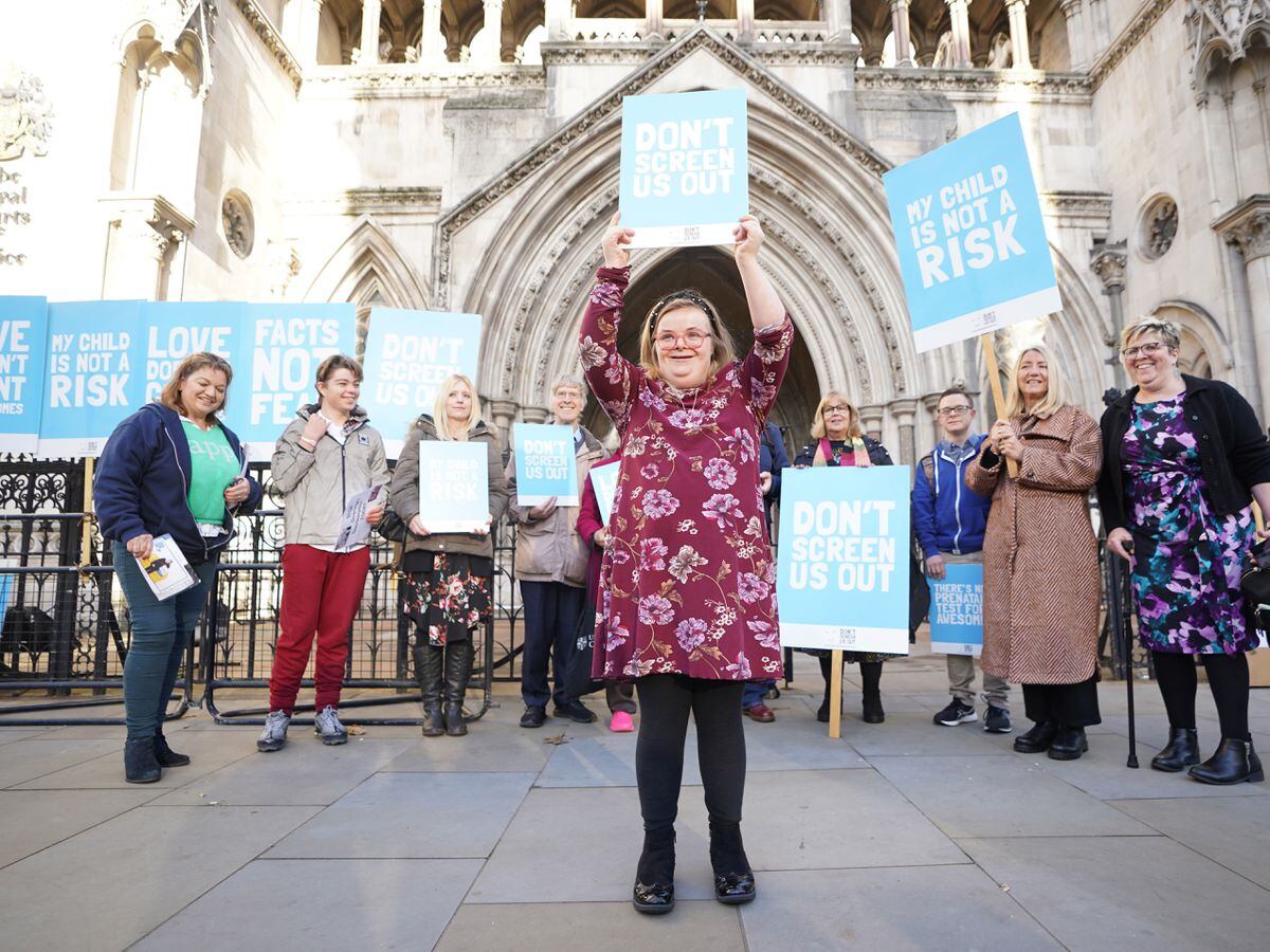 Supporters of Heidi Crowter and Maire Lea-Wilson outside the Royal Courts of Justice in central London