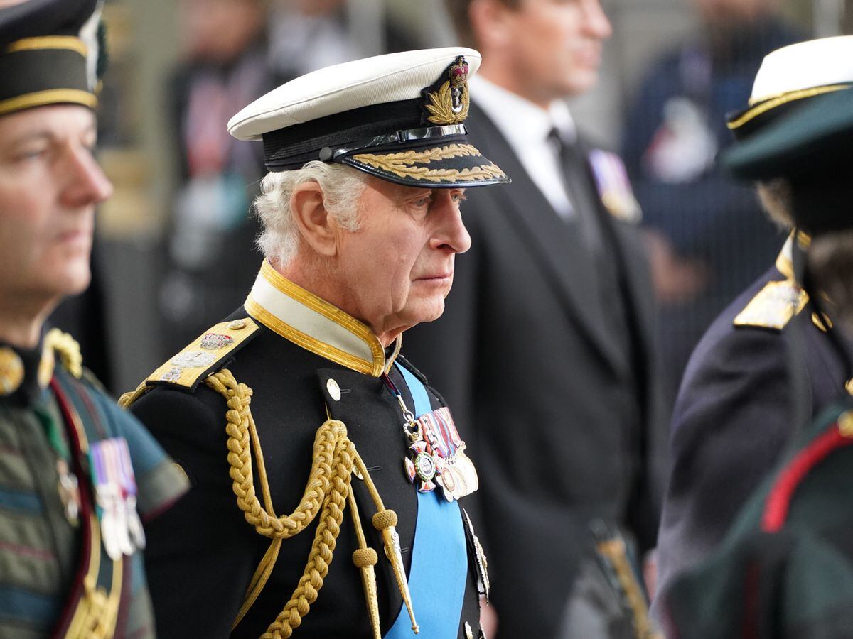 King Charles III follows the coffin of Queen Elizabeth II