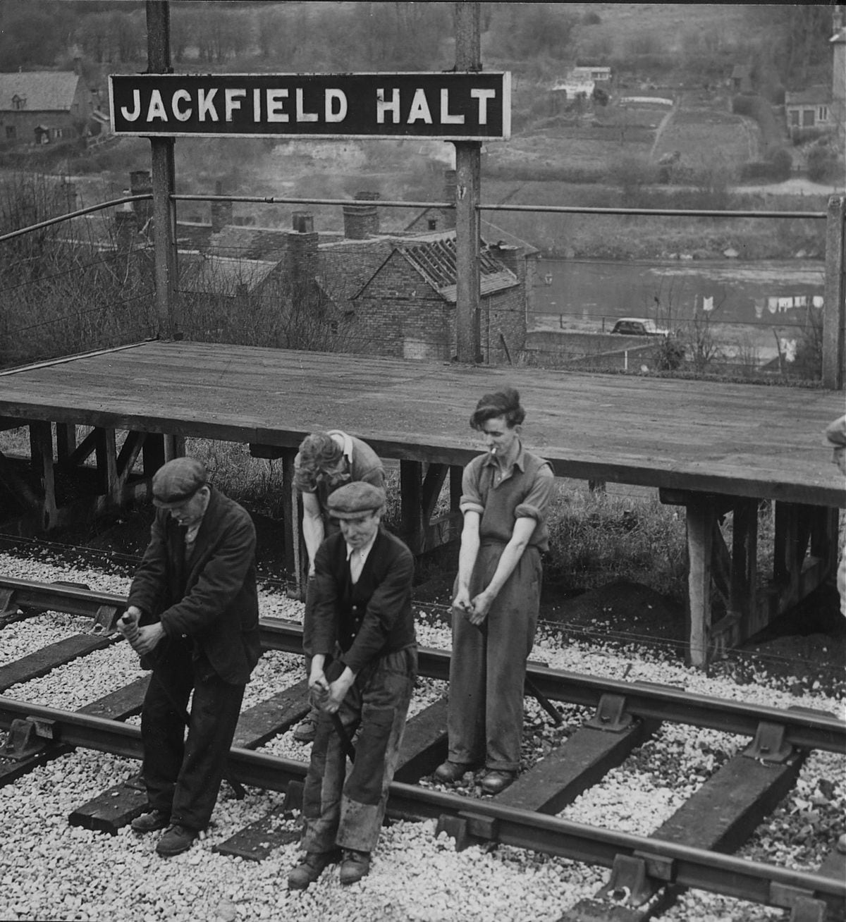 Workmen straightening the distorted railway line. Back: left, Alf Bowdler, a ganger, from Coalport; right, Eddie Minton, from Broseley. Front: left, Reg Wall, from Ironbridge; right, Ted Aston, from Jackfield.