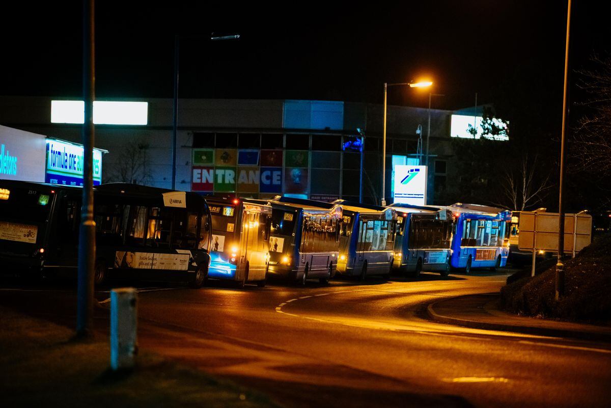 Buses lined up along Arlington Way after a police cordon was put in place