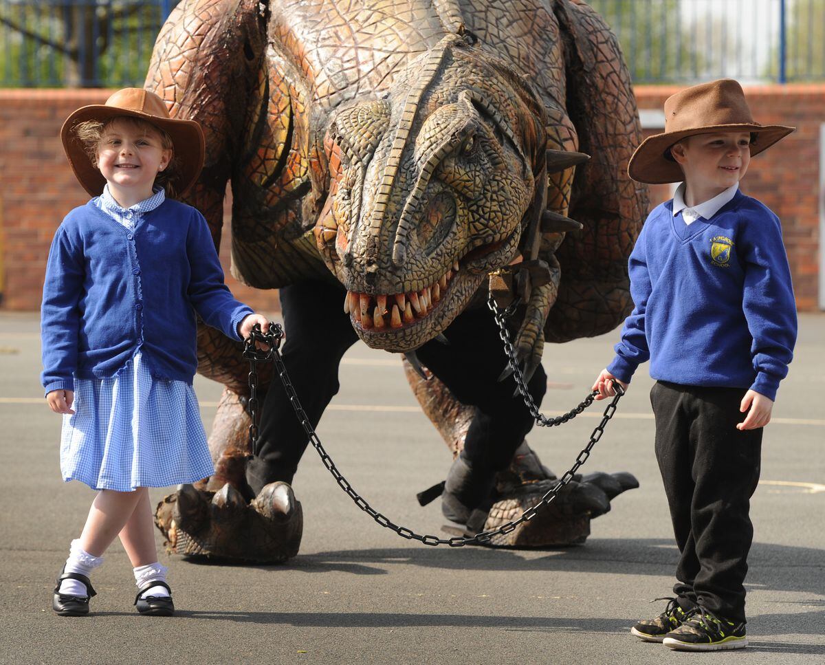 Lucy Henderson and Jack Jones, aged 4, with the T-Rex 