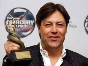Guy Barker holiding a nomination award during the 2002 Panasonic Mercury Music Prize, which takes place at the Le Meridien Grosvenor House, London, Tuesday September 17, 2002. PA photo: Myung Jung Kim