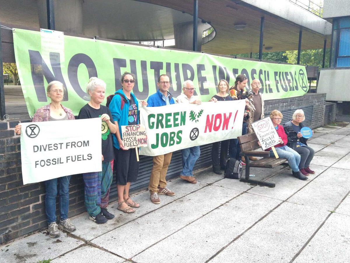 Campaigners from Extinction Rebellion and Fossil Free Shropshire outside Shirehall