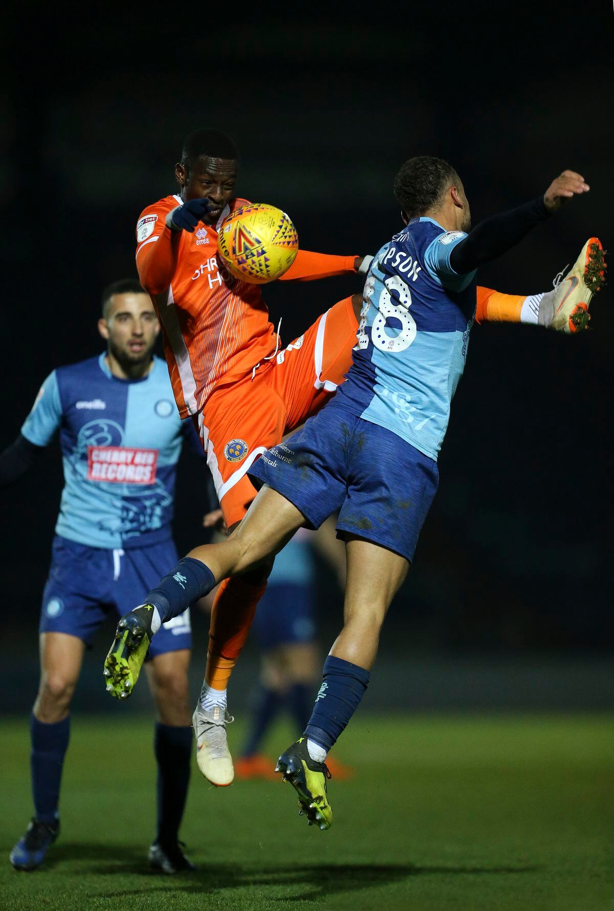 Abo Eisa of Shrewsbury Town and Curtis Thompson of Wycombe Wanderers. (AMA)