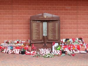 Flowers and tributes left at the Hillsborough Memorial outside Anfield 