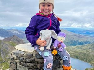 Bea Phillips completed the goal on Monday, with a knitted tribute to Queen Elizabeth II and her adventure bunny buddy, Bun Bun
