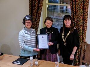 Presenting the award ot Mirjana Garland is High Sheriff, Selina Graham with Councillor Anne Wignall