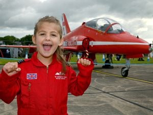 Felicity Haynes, five, couldn't hide her excitement as the RAF Cosford Air show finally returned