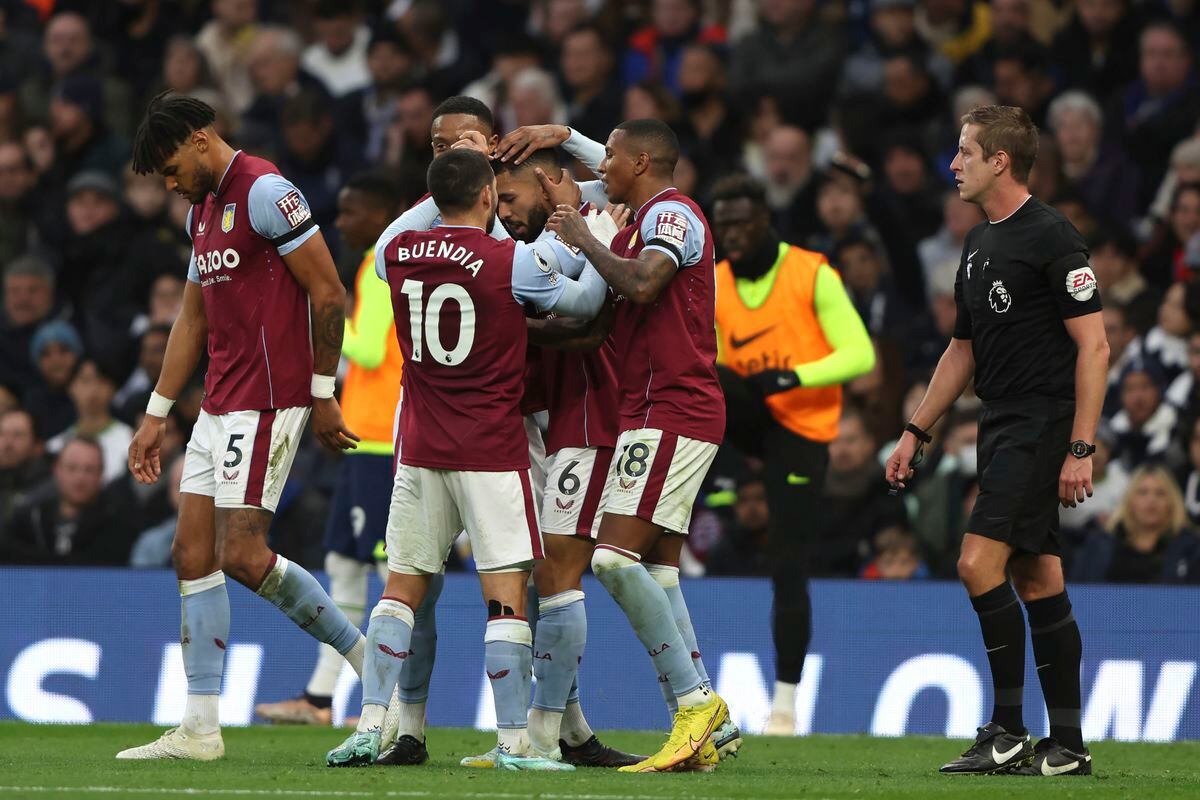 Aston Villa's Douglas Luiz (6) celebrates with teammates(AP Photo/Ian Walton).