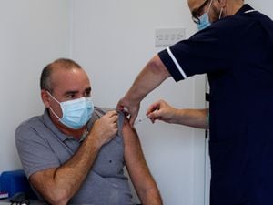 Shrewsbury Town Chief Executive Brian Caldwell getting his vaccination.
