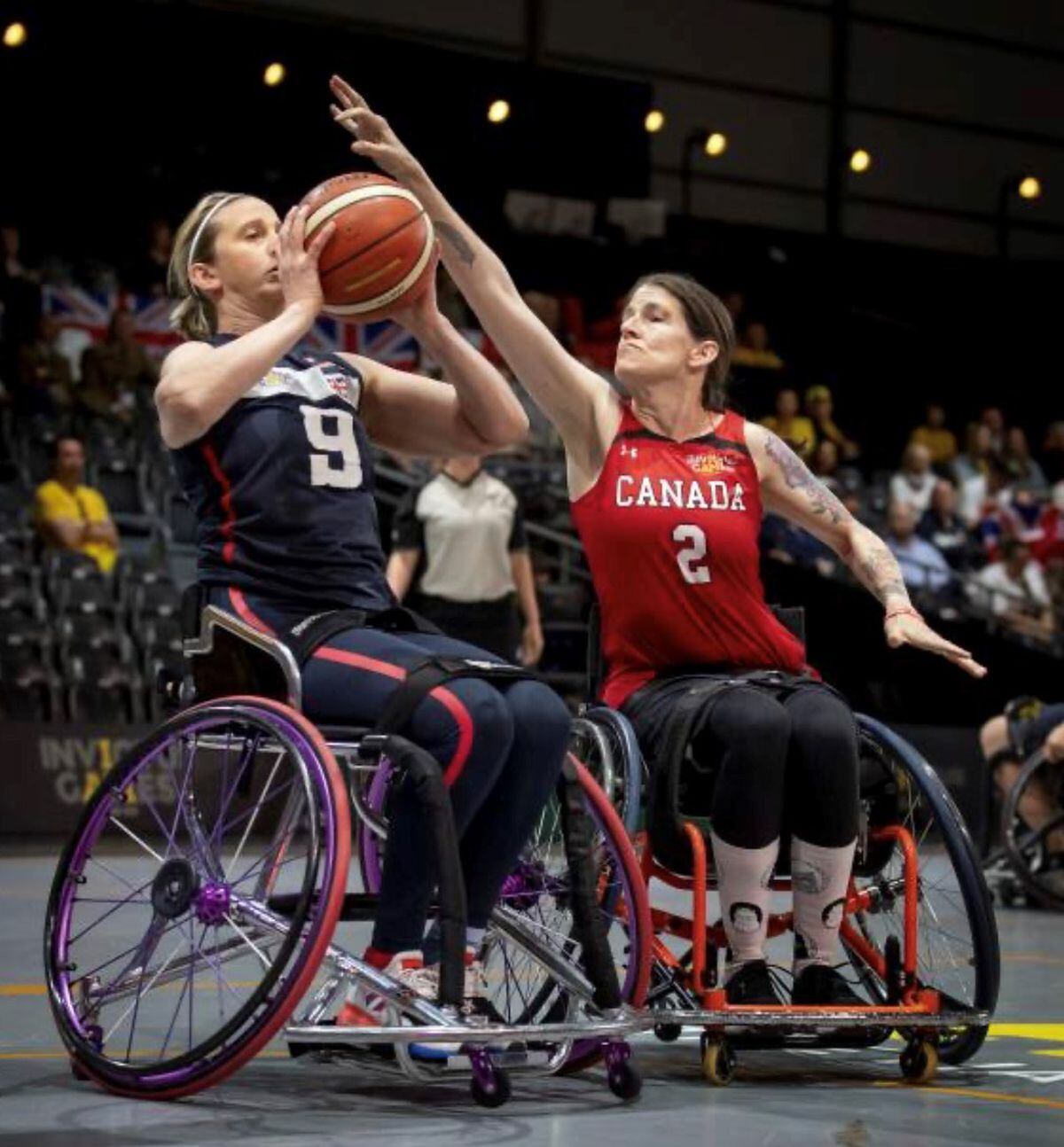 Kelly in action for Team UK in the wheelchair basketball event.