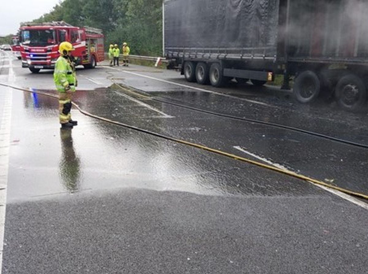 Firefighters dealing with the incident on the M54. Picture: National Highways.