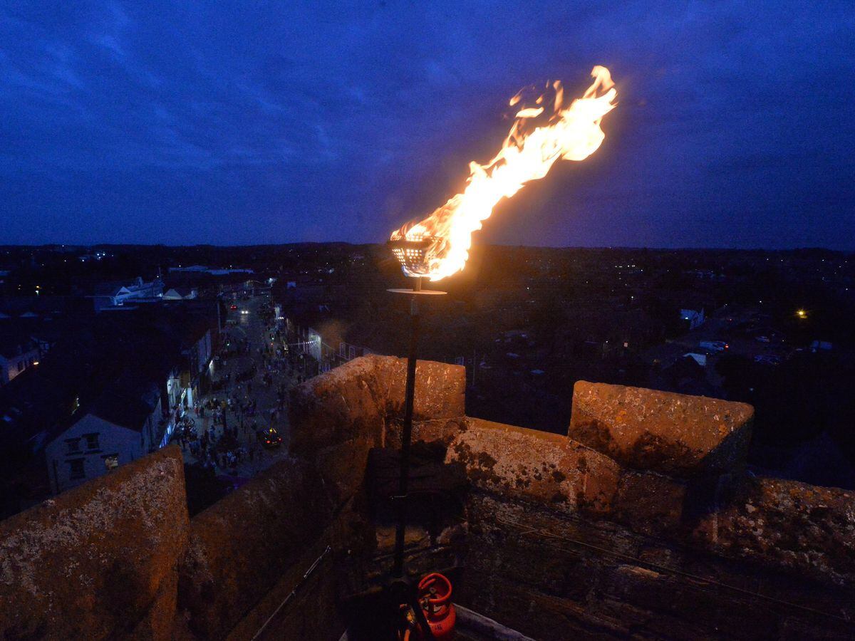 The beacon was lit in Newport as hundreds turned out for the event