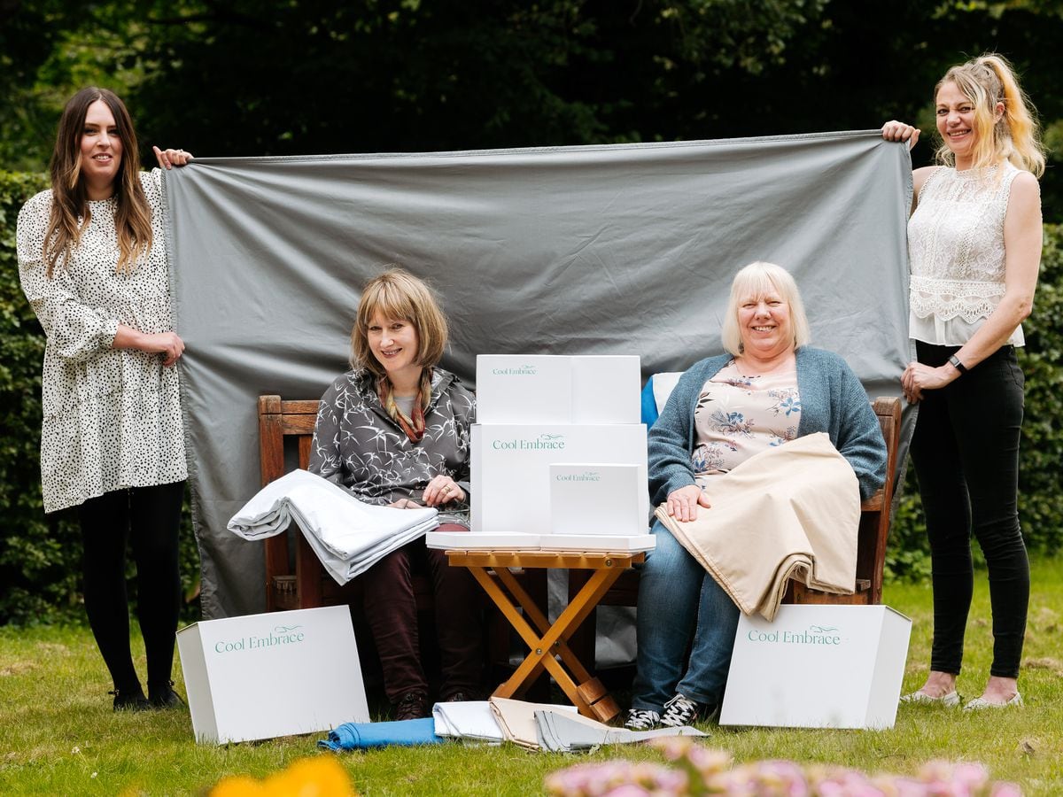 Charlotte Marsden, Lisa Rawlings, Sharon Hoult and Jo Groves, of Cool Embrace, with one of the blankets