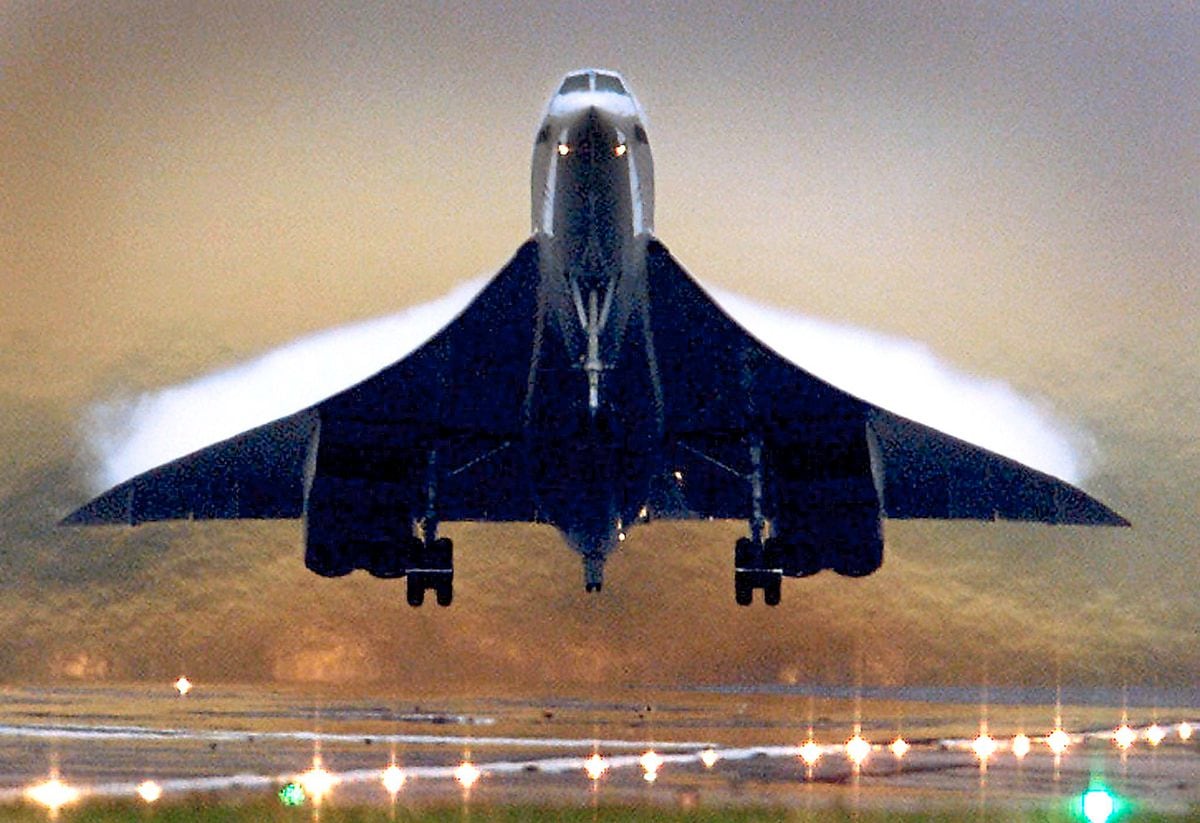 Vapour trails appear on the wings of a British Airways Concorde supersonic aircraft as it takes off from London's Heathrow airport