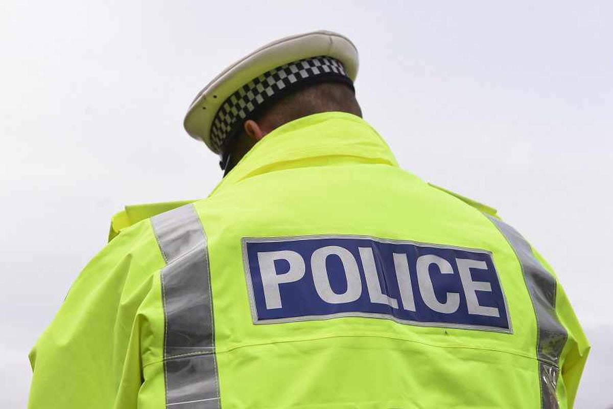Body found in car as police close Shropshire road