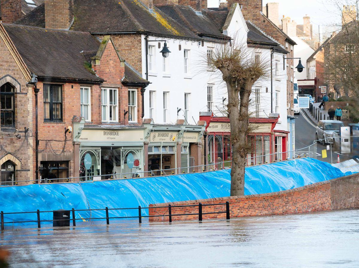 Water could spill over the top of the flood barriers in place along The Wharfage, Ironbridge