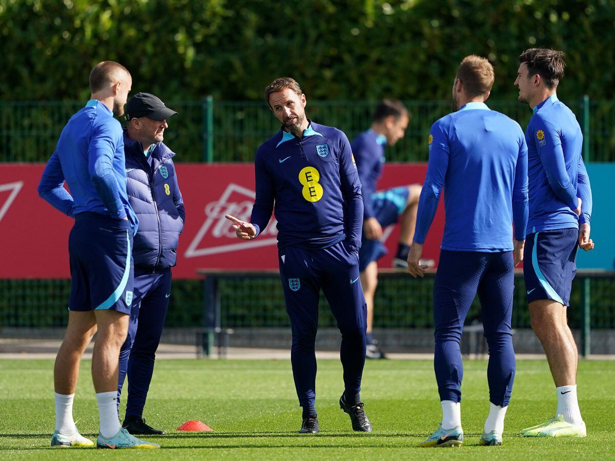 
              
England head coach Gareth Southgate (centre) speaks to Eric Dier (left), Hatrtu Kane (back to camera) and Harry Maguire (right) during a training session at Tottenham Hotspur Training Ground, Enfield. Picture date: Sunday September 25, 2022. PA Photo. See PA story SOCCER England. Photo credit should read: Zac Goodwin/PA Wire.


RESTRICTIONS: Use subject to FA 
restrictions. Editorial use only. Commercial use only with prior written consent of the FA. No editing except cropping.
            
