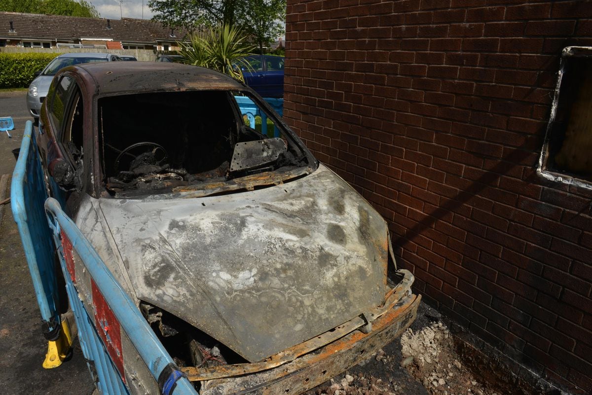 A car destroyed by the house fire in Damson Park, Pattingham.