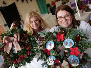 Lauren Kinsey-Owen of Aberedw Young Farmers Club and Sian Healey of Pontfaen Young Farmers Club with the Christmas wreaths they made in the YFC competitions. 
