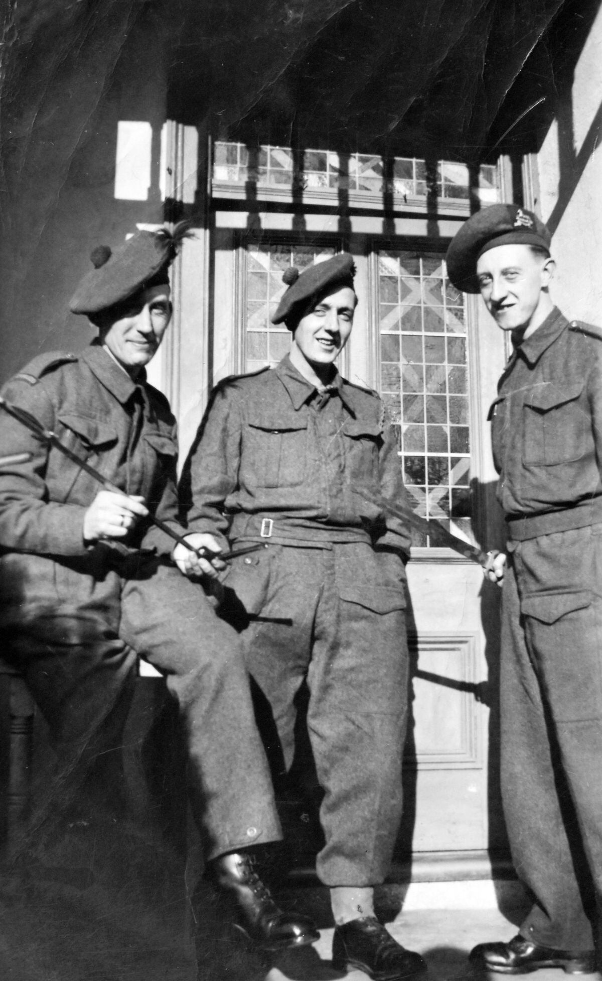 Lionel, left, with two unidentified Commando colleagues. 