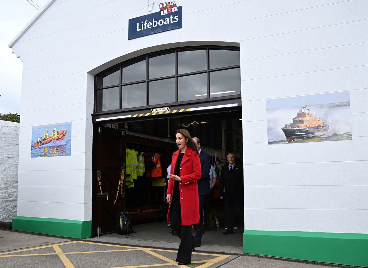 
              
The Prince and Princess of Wales during their visit to the RNLI Holyhead Lifeboat Station in Anglesey, north Wales, where they met with crew, volunteers and some of those who have been supported by their local unit. Picture date: Tuesday September 27, 2022. PA Photo. Holyhead is one of the three oldest lifeboat stations on the Welsh coast and has a remarkable history of bravery, having received 70 awards for gallantry. See PA story ROYAL Wales. Photo credit should read: Paul Ellis/PA Wire
            
