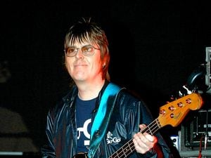 Andy Rourke in 2006 during a 'Manchester Versus Cancer' charity concert. Photo: Steve Parsons/PA Wire