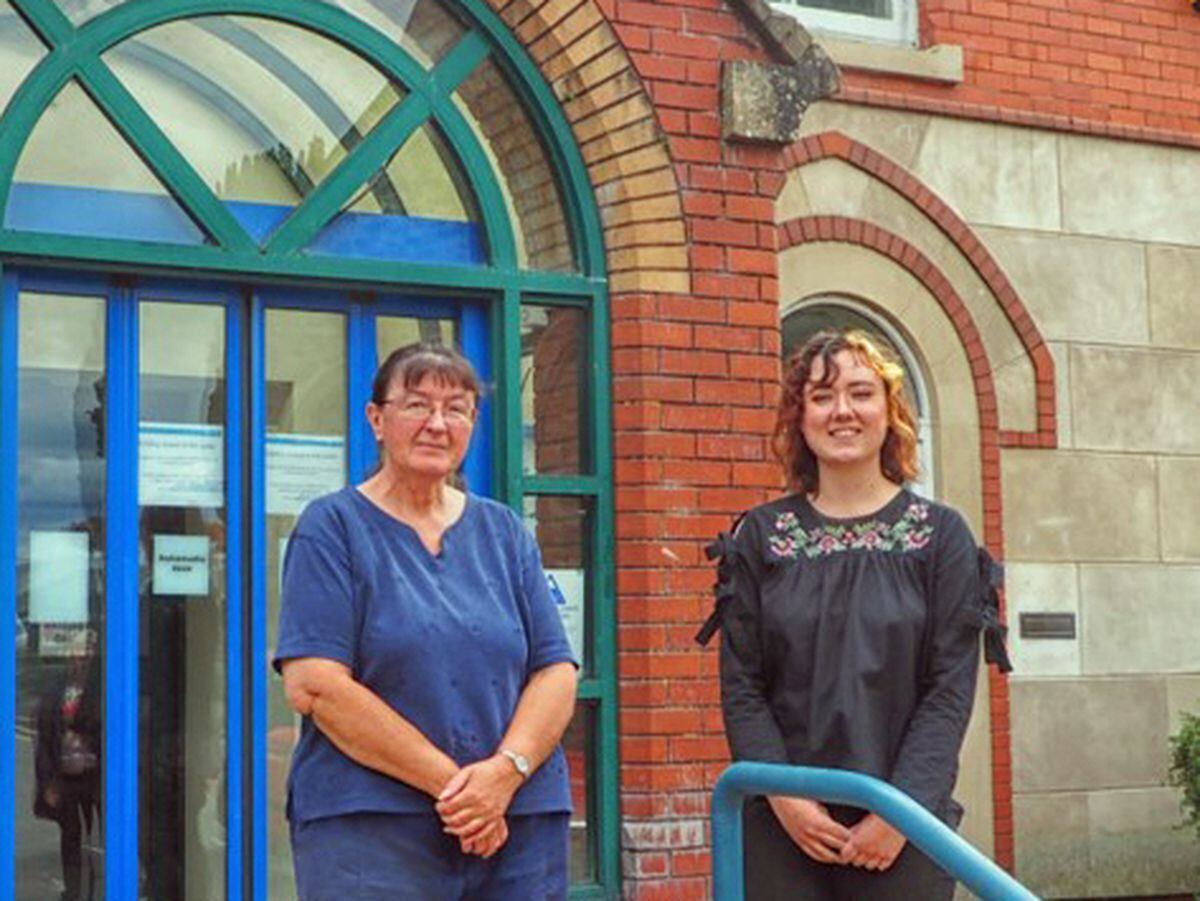 Karen Pringle and Charlotte Phillips outside Oswestry Tourist Information Centre