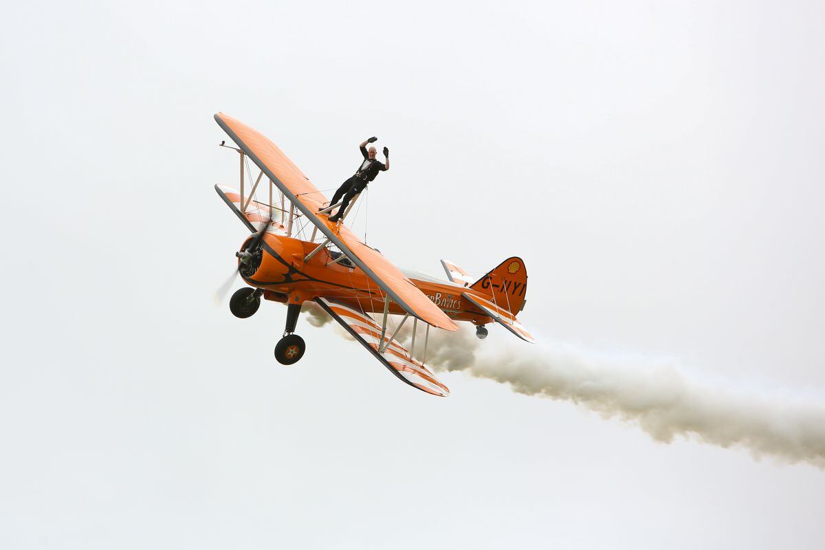 One of the wing walkers in action. Photo by Neil Tung
