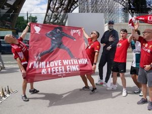 Liverpool fans near the Eiffel Tower in Paris ahead of Saturday’s Uefa Champions League final between Liverpool FC and Real Madrid at the Stade de France